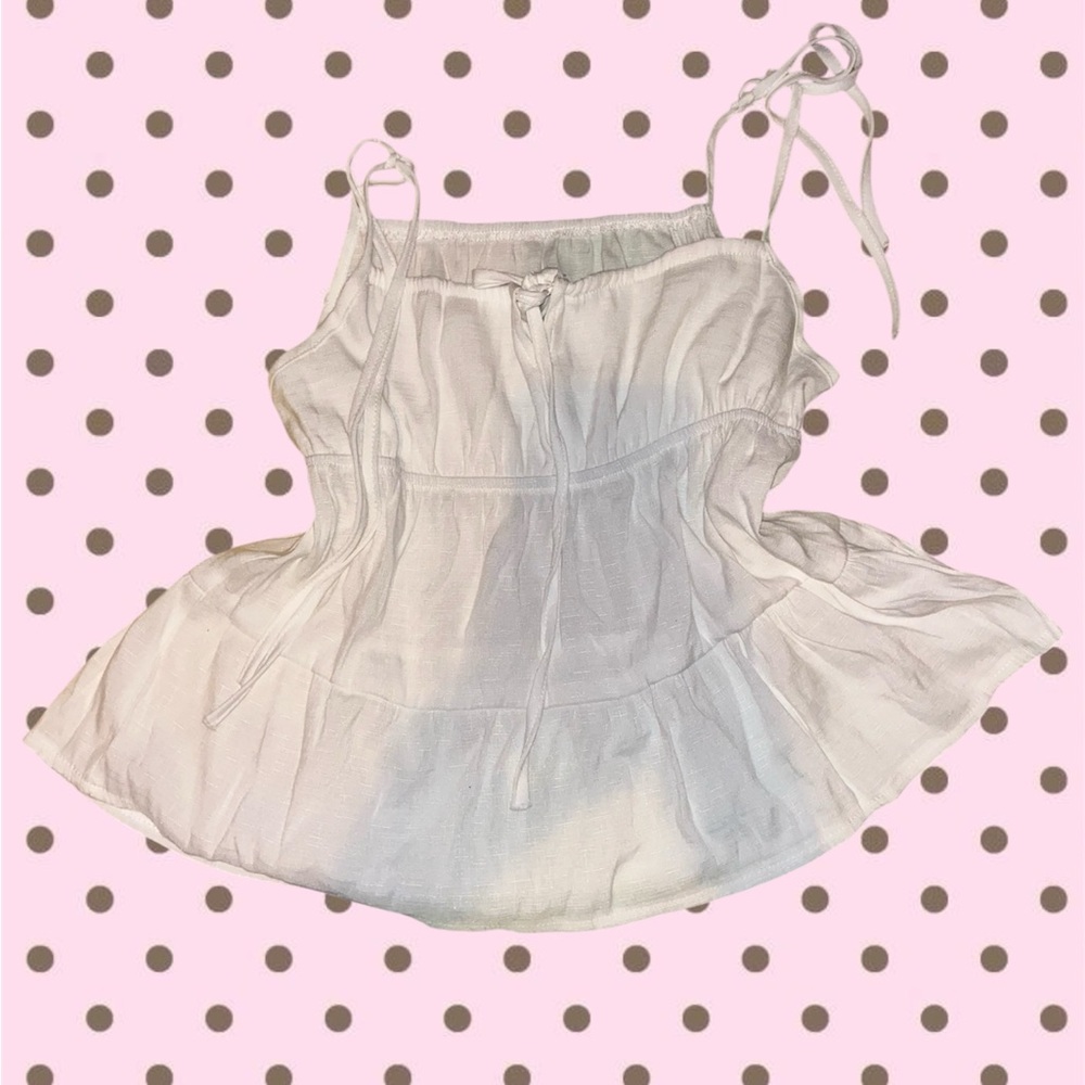 White Sleeveless Peplum Top
